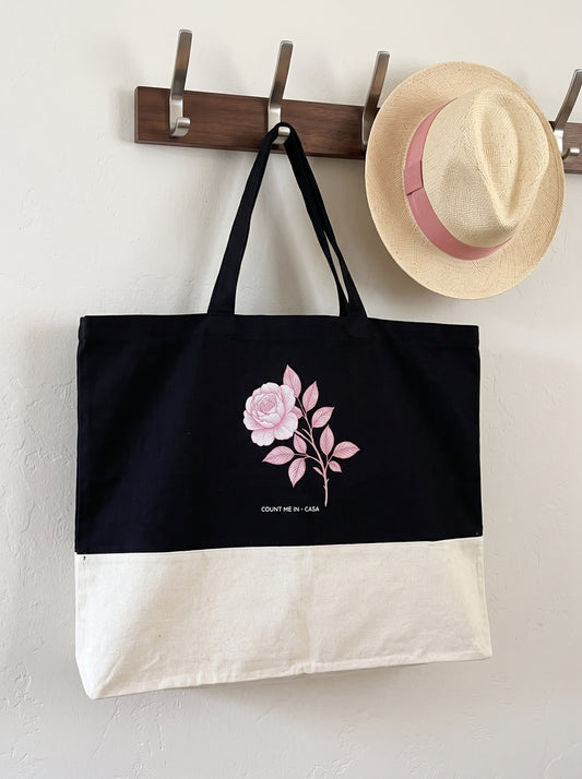 Charcoal Peony organic cotton shopping bag by Count Me In - Casa hanging on a wall hook