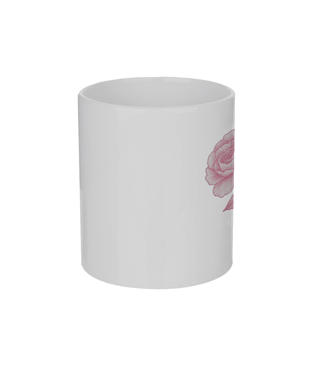 White mug with a pink floral design on a white background